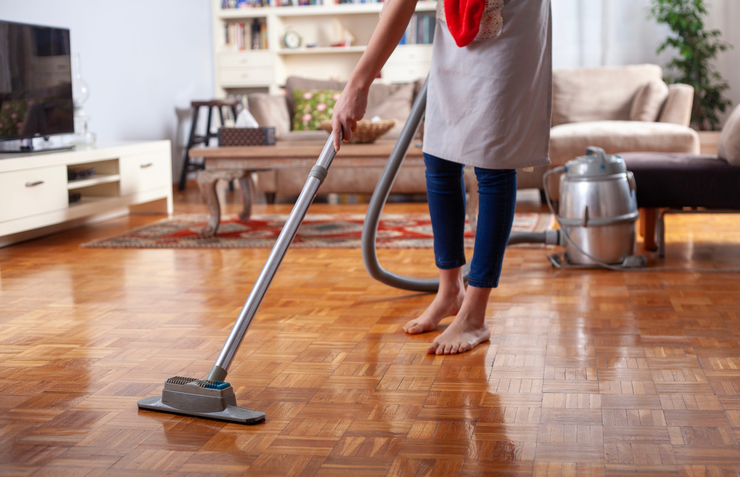 Wood Floor Sanding in Southwoodford with aftercare cleaning on an oak mosaic parquet wood block living room floor, keeping the freshly finished surface glossy.